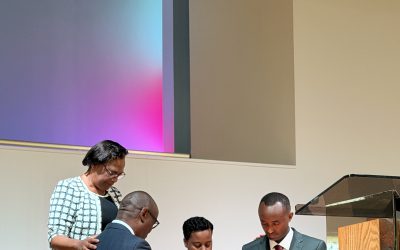 Pastor Maxi prays over Pastor Sano and family